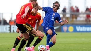 AFP/MARKO PERKOV Luka Modric (re.) nimmt mit Kroatien zum fünften Mal an der Weltmeisterschaft teil.