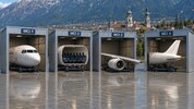 Trauriger MCI-Alltag: Der Flieger ist zwar da, aber er muss vor dem Start erst zusammengebaut ...