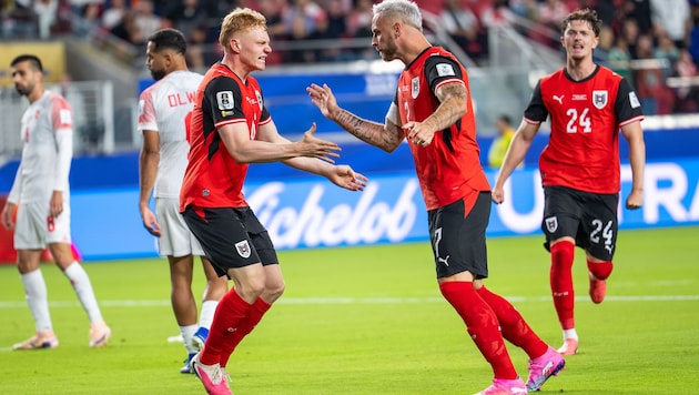 Austria celebrates its opening match.