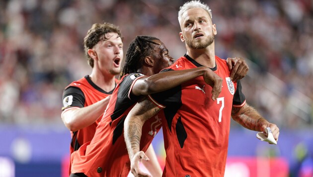 The Austrian national team celebrates at the start of the World Cup.