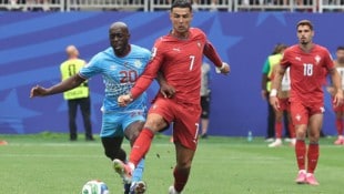 Yoane Wissa (links) hat sich mit seinem Treffer in die WM-Geschichtsbücher eingetragen. 
