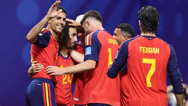 Marc Cucurella (No. 24) is celebrated after scoring the goal that made it 4–0.