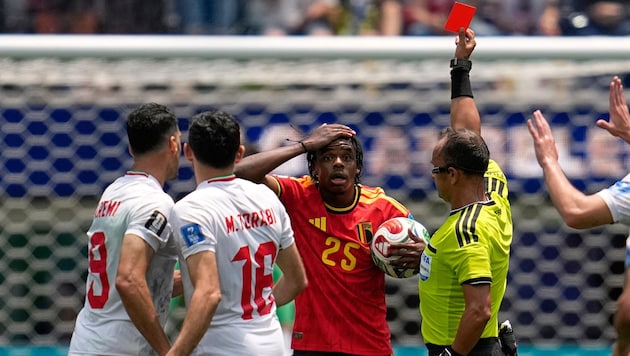 Belgium’s Nathan Ngoy was shown a red card in the 66th minute.