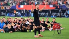 Kapitän Martin Ödegaard gab nach dem 3:2 gegen Senegal an der Trommel den Takt für den ...