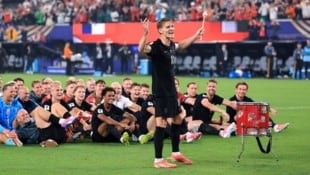 Kapitän Martin Ödegaard gab nach dem 3:2 gegen Senegal an der Trommel den Takt für den ...