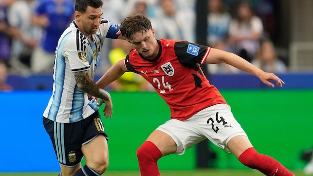 Paul Wanner im Duell mit Lionel Messi beim WM-Spiel Österreich gegen Deutschland