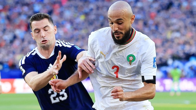 Will Noussair Mazraoui (right) retire after the World Cup?