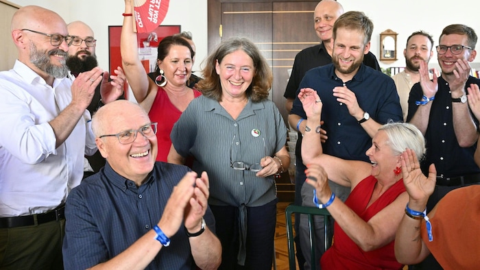 Election winner Kahr is celebrated by her team.