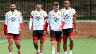 Die deutschen Teamspieler Deniz Undav, Nadiem Amiri, Pascal Gross und Jamie Leweling (von links) ...