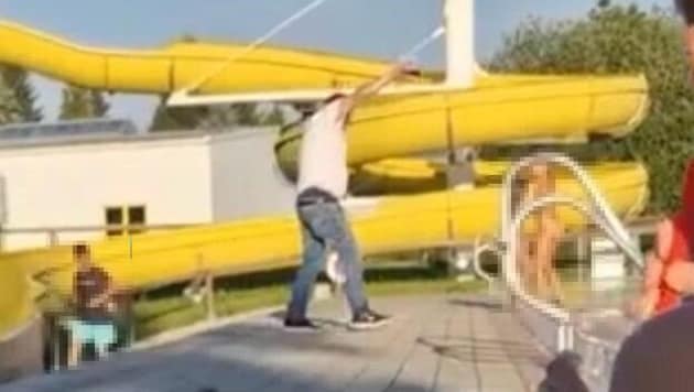 Crazy! This screenshot shows the lifeguard firing a Taser shot toward the lap pool.
