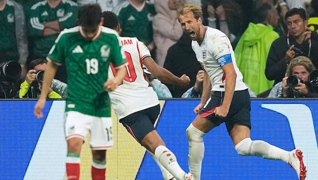 England can celebrate advancing to the quarterfinals.
