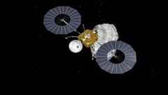Diese künstlerische Darstellung zeigt die Raumsonde „Tianwen-2“ bei der Annäherung an den ...