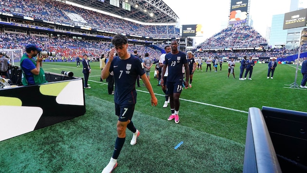 A bitter 1–4 loss to Belgium—the U.S. is out.