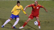 Gabriel Mureșan im Teamdress Rumäniens (re.) bei einem Testspiel gegen Brasilien mit dem damals ...