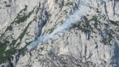 Dichter Rauch an der Wand des Rauchecks auf 1700 Metern Höhe.
