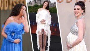 So sieht pures Glück aus: Anne Hathaway präsentiert stolz ihren „Last-Minute-Treffer“ auf der ...