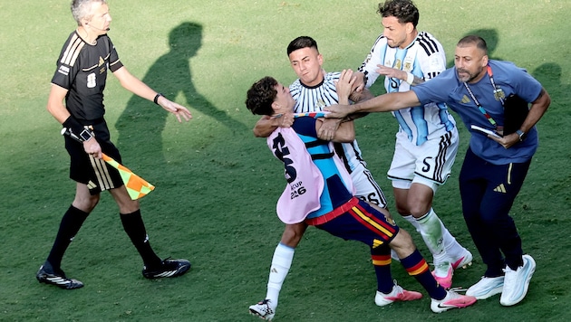 Argentina’s Leandro Paredes (2nd from right) lashed out at the Spanish players after the World ...