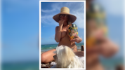Andere packen Sonnencreme ein, Heidi packt ihre Chips aus: Die Model-Queen gönnt sich am Strand ...