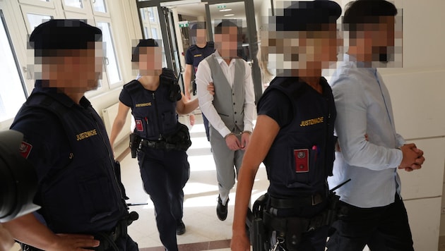 Only two of the defendants: the one in the gray suit also attacked the elderly woman from Lower ...
