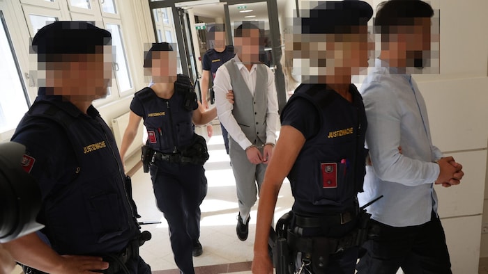 Only two of the defendants: the one in the gray suit also robbed the elderly woman from Lower ...