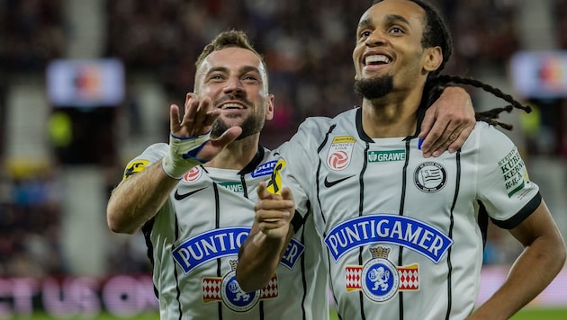 Jürgen Heil with goal scorer Emran Soglo