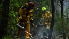 Feuerwehrleute in Le Porge