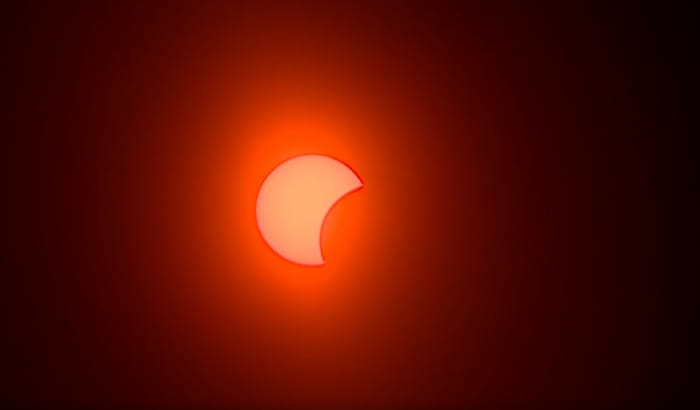 The solar eclipse at 7:45 p.m.
