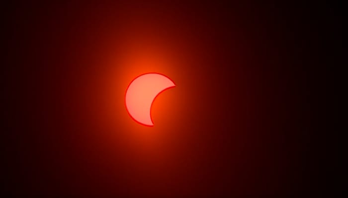 The solar eclipse at 7:50 p.m.