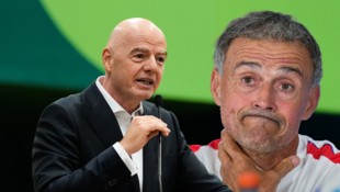 Luis Enrique (r.) möchte sich nicht zur Causa rund um Gianni Infantino (l.) äußern.