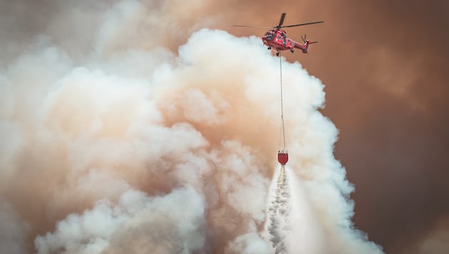 Die Spezialhubschrauber der Heli Austria bekämpfen weltweit Waldbrände – in Tirol werden die ...
