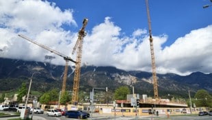 Wachsen bei einer treffsicheren Baulandabgabe mehr Kräne für leistbares Wohnen in den Himmel? ...