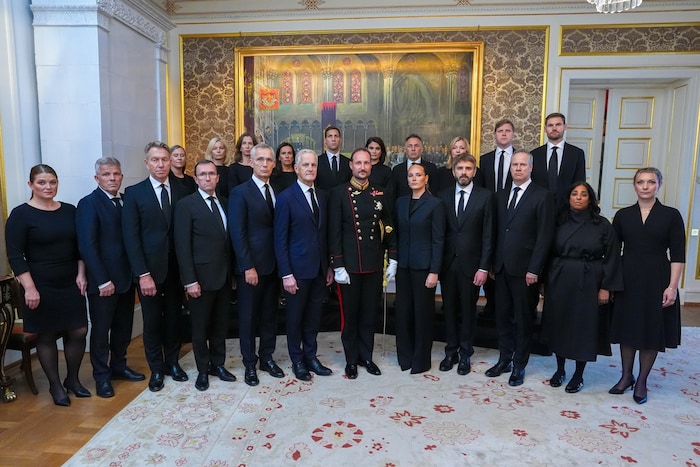 King Haakon and Crown Princess Ingrid Alexandra at a photo session with members of the ...