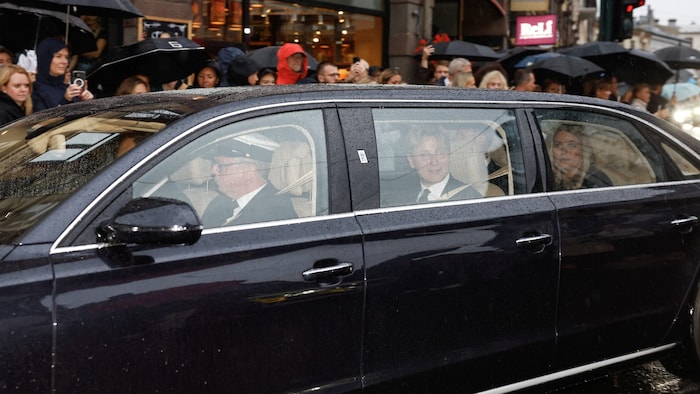 Queen Mette-Marit and Prince Sverre Magnus at the funeral procession