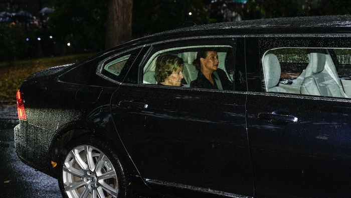 Queen Sonja and Princess Märtha Louise are sitting in a car following King Harald’s coffin to ...