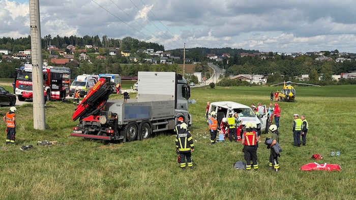 The truck had struck the kindergarten bus on the side.