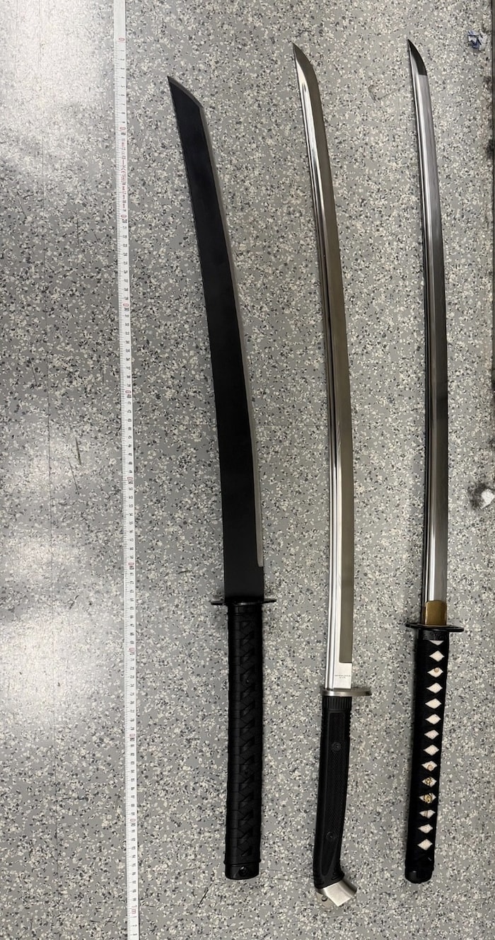 Officers also seized three swords.