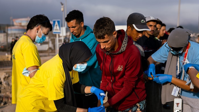 Migranten bei der Registrierung