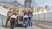 Das Team um Robert Krickl (li.) jubelt bei der Ankunft in Monaco.