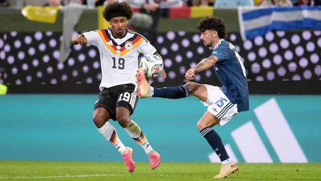 Wem gehörte die Stimme, die Karim Adeyemi (links) lautstark anfeuerte?