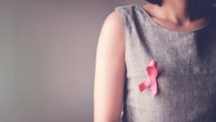 Die rosa Schleife zeigt Solidarität mit Brustkrebs-Patientinnen wie mir.