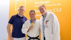 Dr. Stefan Kastl, Goldmedaillen-Gewinner Karl „Charly“ Moser, Dr. Dominik Wiedermann.