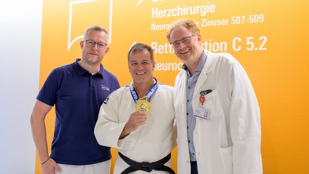Dr. Stefan Kastl, Goldmedaillen-Gewinner Karl „Charly“ Moser, Dr. Dominik Wiedermann.