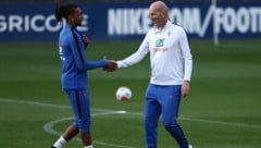 Auch Frankreichs Teamchef Zinedine Zidane schwärmt von Michael Olise (li.).