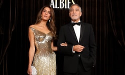 Anwältin Amal Clooney (l.) und US-Schauspieler George Clooney bei den Albies Awards im Londoner ...