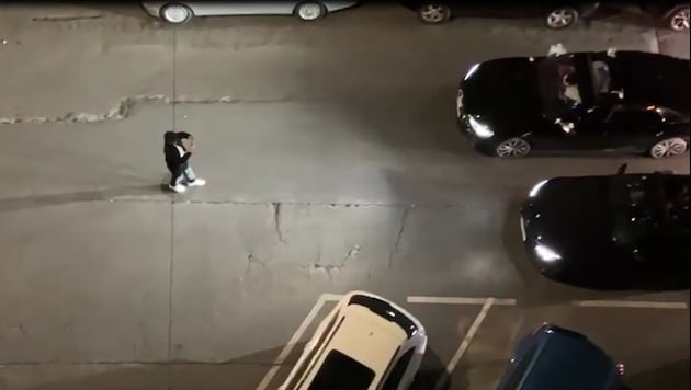 Photos and videos of the flashy cars are taken with utter calm—while chaos erupts in the ...