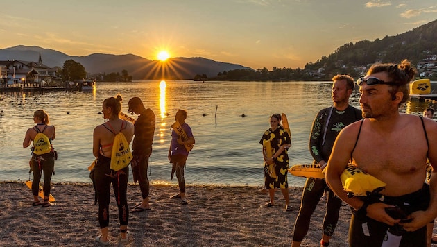 Vollmondschwimmen statt Kältekammer. Am Faaker See wagen viele die Mutprobe.