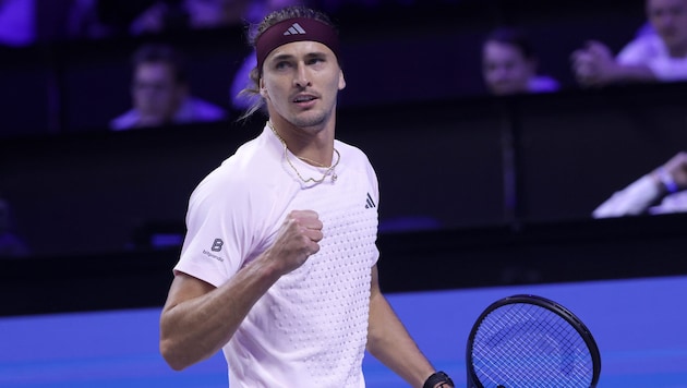 Alexander Zverev clenches his fist—he’s advanced to the next round.
