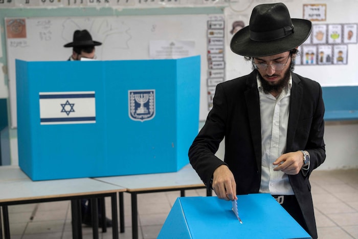 An ultra-Orthodox Jew casting his vote in Bnei Brak