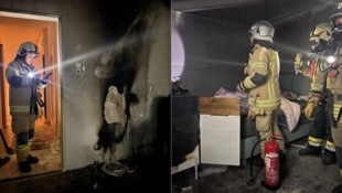 Die Einsatzkräfte in der verrauchten Wohnung in dem Mehrparteienhaus..