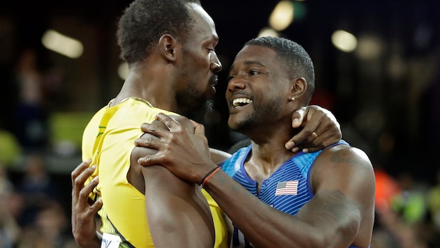 Justin Gatlin (rechts) und Usain Bolt (Bild: AP)